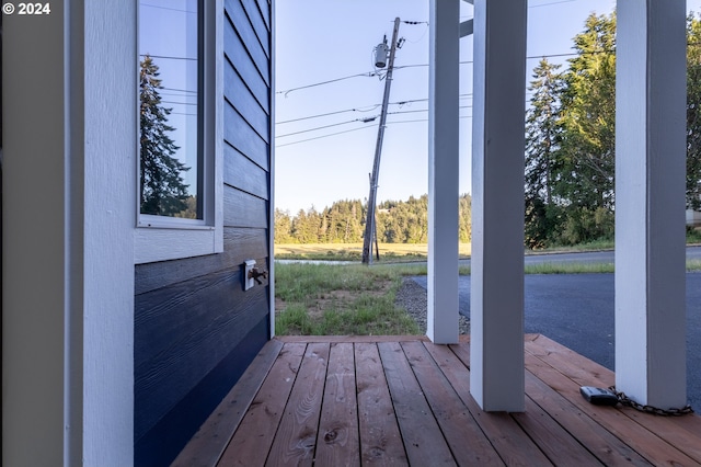 entryway with wood-type flooring