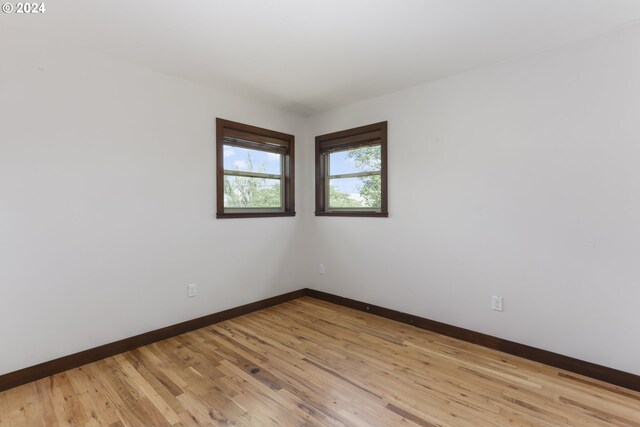 empty room featuring light hardwood / wood-style floors