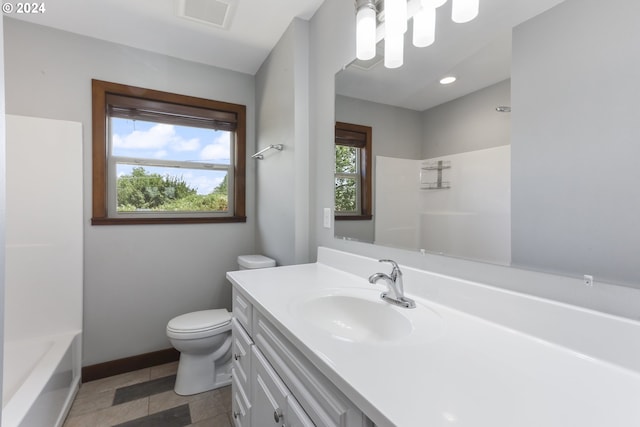 full bathroom with vanity, bathtub / shower combination, and toilet