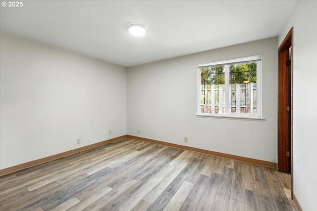 19875 SW Southview St, Beaverton, OR 97078 - empty room featuring wood finished floors and baseboards