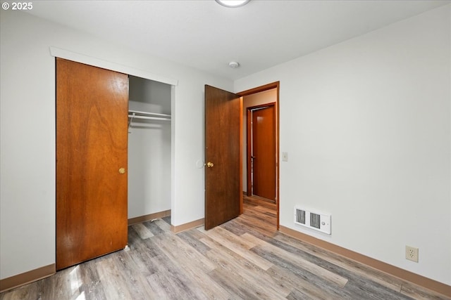 19875 SW Southview St, Beaverton, OR 97078 - unfurnished bedroom featuring light wood-style floors, a closet, and baseboards