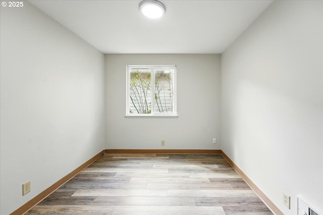 19875 SW Southview St, Beaverton, OR 97078 - empty room with light wood-style flooring and baseboards