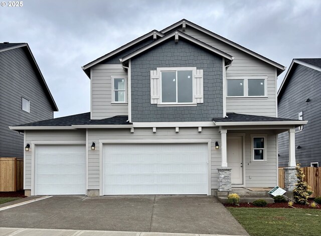 craftsman-style home featuring a garage