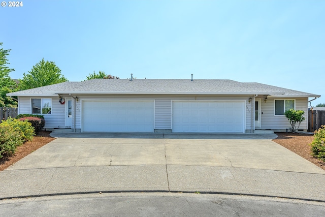 ranch-style home with a garage