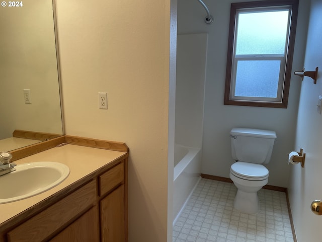 full bathroom featuring vanity, shower / bath combination, and toilet