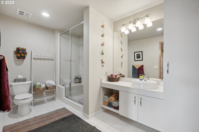 full bath with a stall shower, visible vents, toilet, tile patterned floors, and vanity