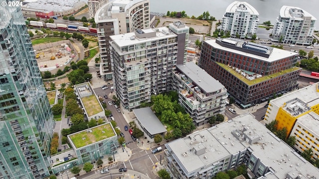 birds eye view of property with a city view