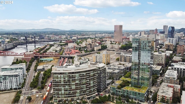 city view featuring a water and mountain view