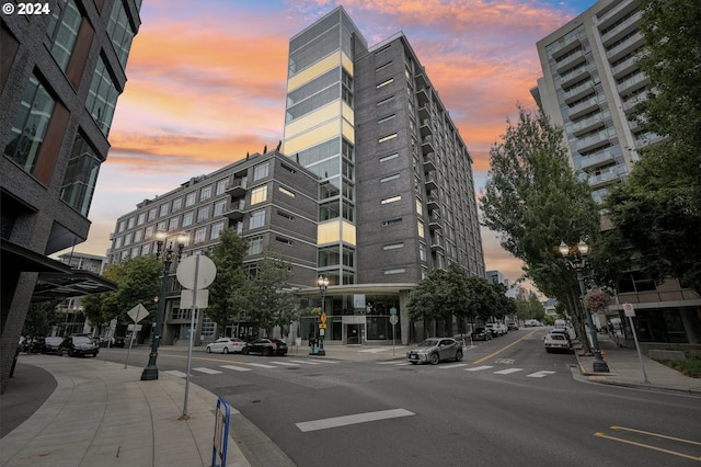 view of outdoor building at dusk