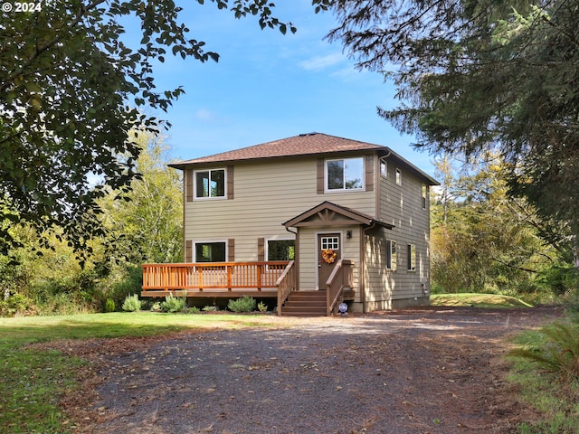 view of front of house with a deck