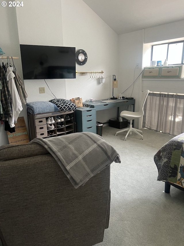 interior space with lofted ceiling and light colored carpet