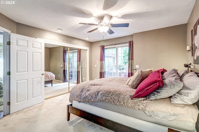 bedroom with carpet, ceiling fan, and access to outside