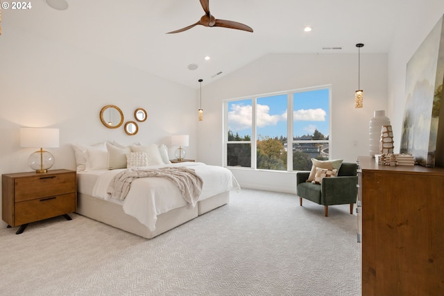 bedroom with ceiling fan, light carpet, and lofted ceiling