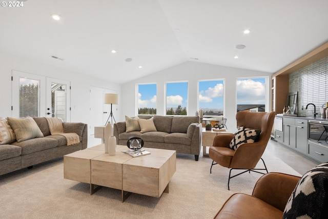 23141 SW Curry Ridge Dr, Sherwood, OR 97140 - living area featuring vaulted ceiling and light carpet