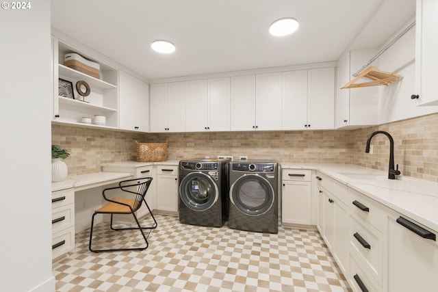 23141 SW Curry Ridge Dr, Sherwood, OR 97140 - laundry room with independent washer and dryer, cabinet space, and light floors