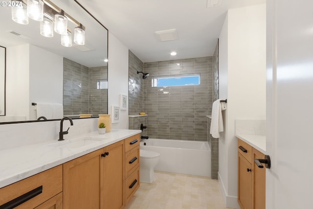 bathroom featuring tub / shower combination, visible vents, toilet, and vanity