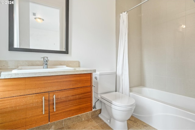 bathroom featuring toilet, shower / bath combo, and vanity