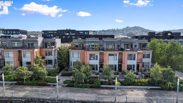 view of building exterior with a mountain view