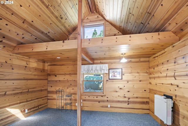 additional living space with wood ceiling, wooden walls, lofted ceiling, and carpet flooring