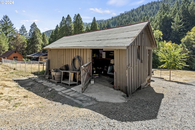 view of outdoor structure with a mountain view