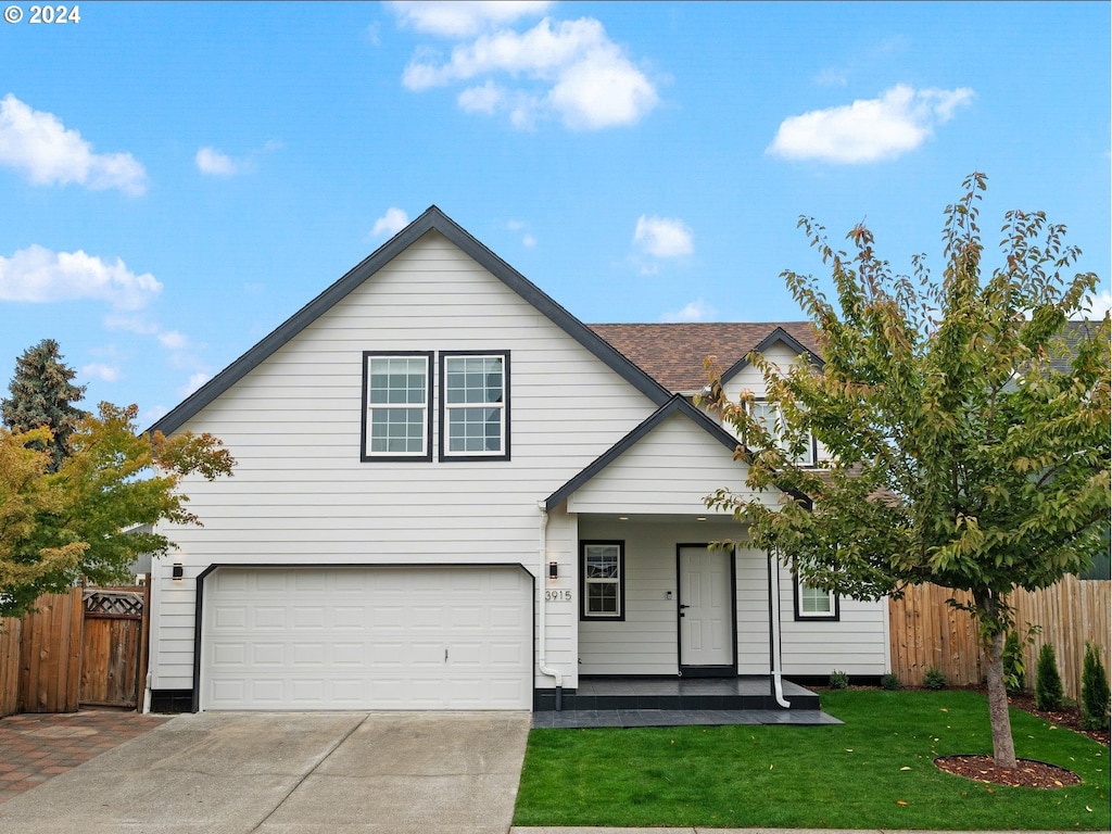 view of front of house featuring a porch and a front yard