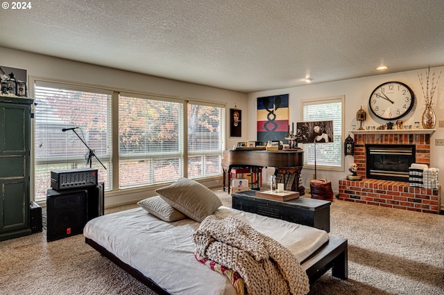 carpeted living room with a fireplace and a textured ceiling