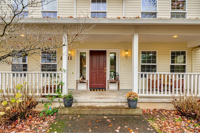 doorway to property featuring a porch