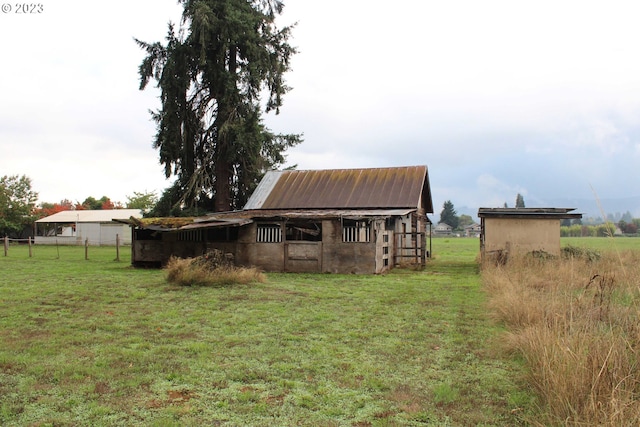 exterior space with a rural view