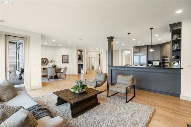 living room with light hardwood / wood-style floors