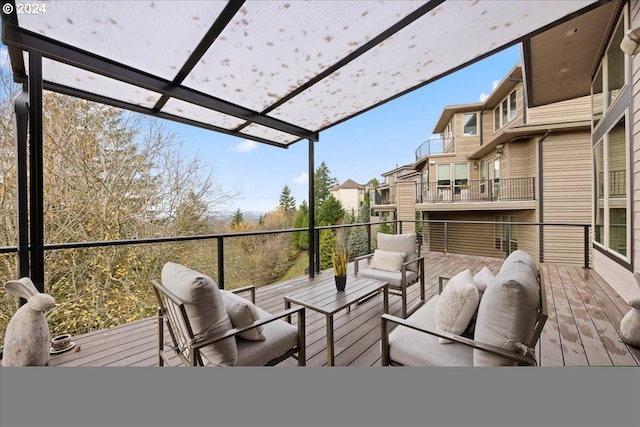 exterior space featuring outdoor lounge area and a pergola