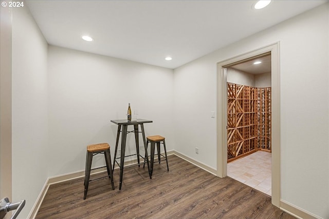 wine area featuring dark hardwood / wood-style floors