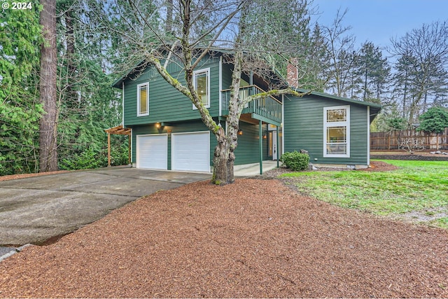 view of front facade featuring a garage and a deck