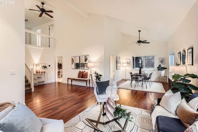 living room with ceiling fan, high vaulted ceiling, and hardwood / wood-style flooring