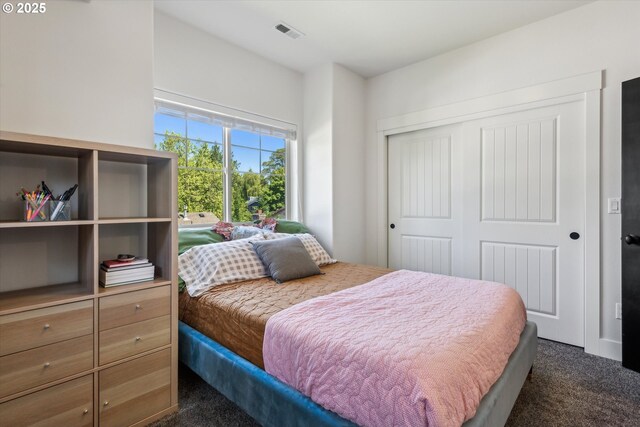 19639 SW Blackbear Ct, Beaverton, OR 97006 - bedroom featuring dark colored carpet and a closet