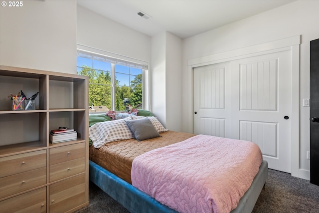 19639 SW Blackbear Ct, Beaverton, OR 97006 - bedroom with dark carpet and a closet