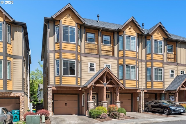 19639 SW Blackbear Ct, Beaverton, OR 97006 - view of property with a garage, driveway, and board and batten siding