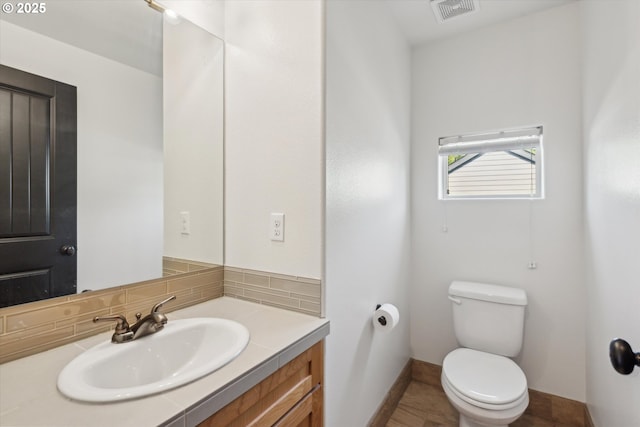 19639 SW Blackbear Ct, Beaverton, OR 97006 - bathroom featuring vanity and tasteful backsplash