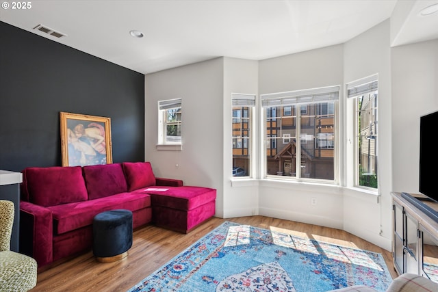 19639 SW Blackbear Ct, Beaverton, OR 97006 - living room with wood finished floors, recessed lighting, and baseboards