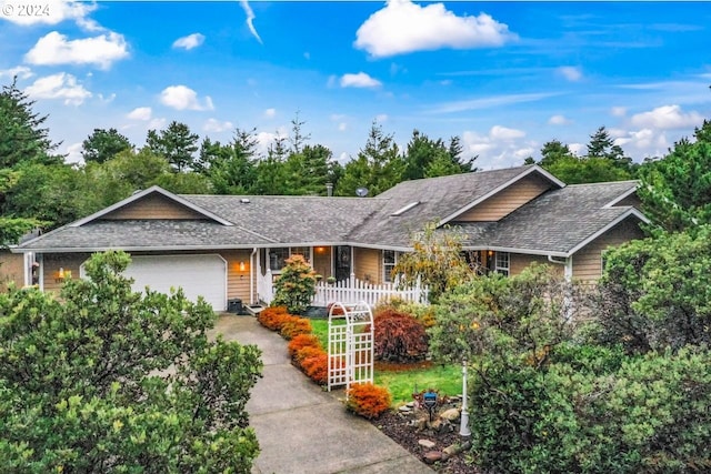 ranch-style home featuring a garage