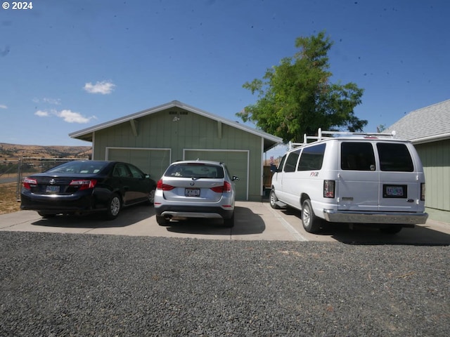 view of side of property featuring a garage