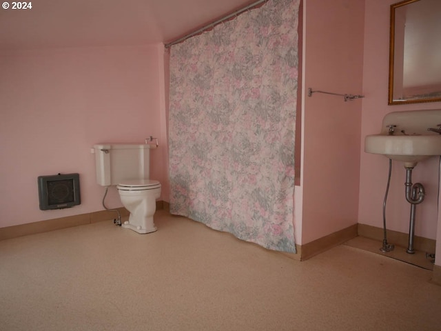 bathroom featuring toilet