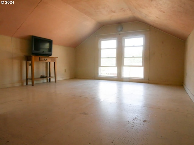 bonus room featuring lofted ceiling