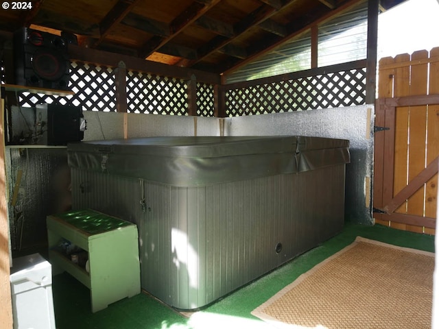 exterior space featuring a hot tub