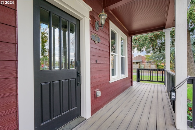 deck featuring covered porch