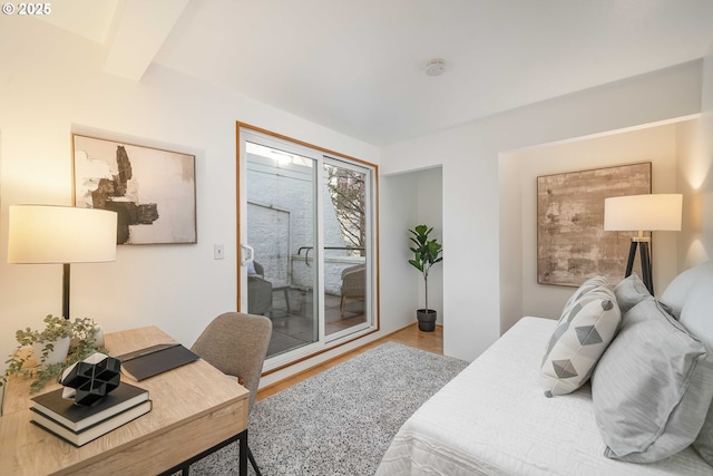 bedroom with beamed ceiling