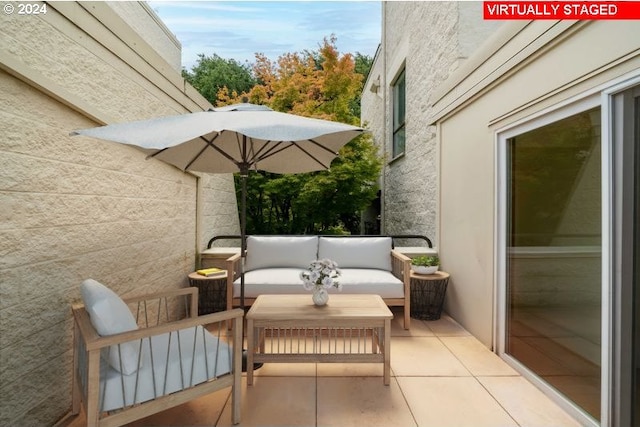 view of patio / terrace with an outdoor hangout area