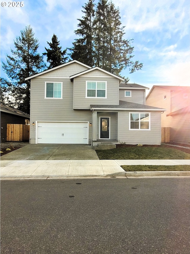 5917 NE 68th St, Vancouver, WA 98661 - traditional-style house featuring a garage, concrete driveway, and fence