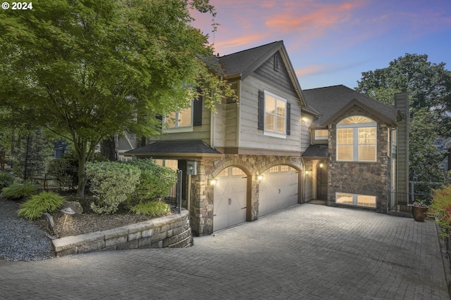 view of front of home with a garage