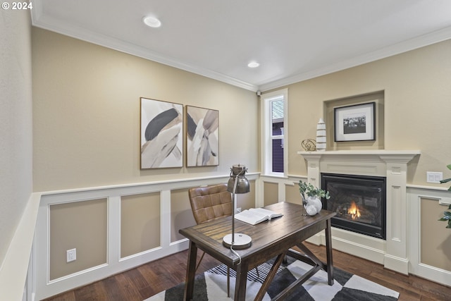 home office with crown molding and dark wood-type flooring