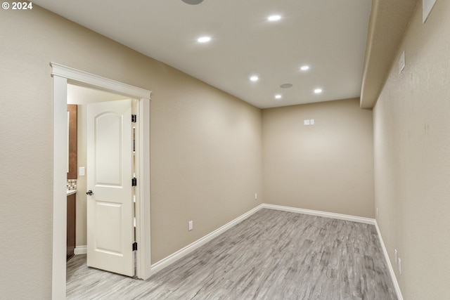 unfurnished room featuring light wood-type flooring